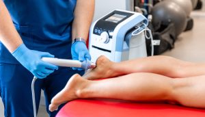 Aesthetic practitioner performing a non-surgical lower leg treatment to address cankles, where the ankle and calf appear less defined.